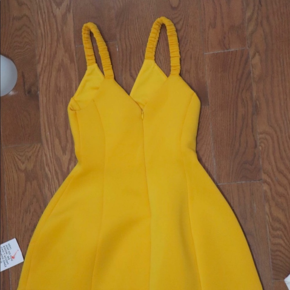 Mini yellow summer dress.